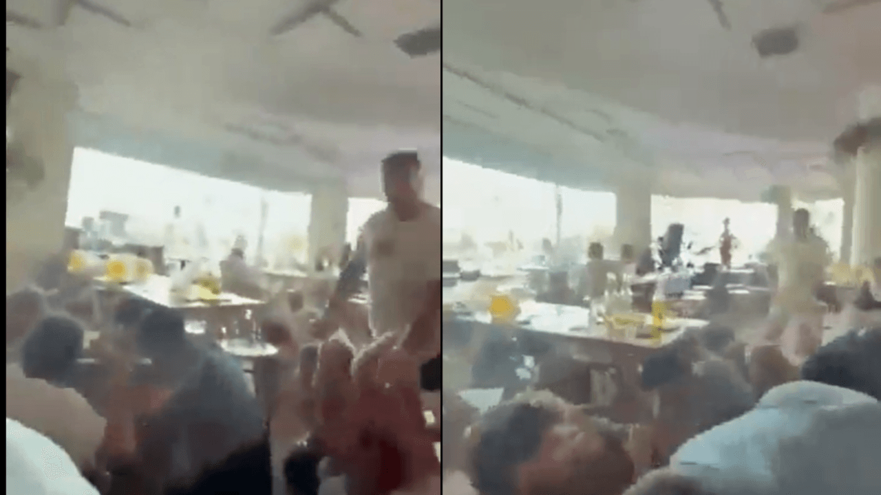 Bondi beach mass shooting: Video captures people fleeing to nearby cafe for cover - watch