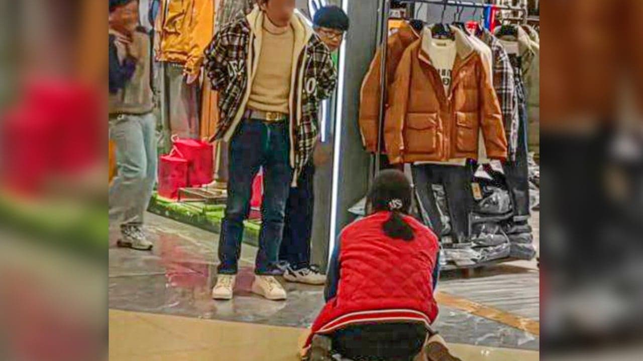 China husband makes wife kneel, beg him to buy down jacket in shop, sparking public outrage