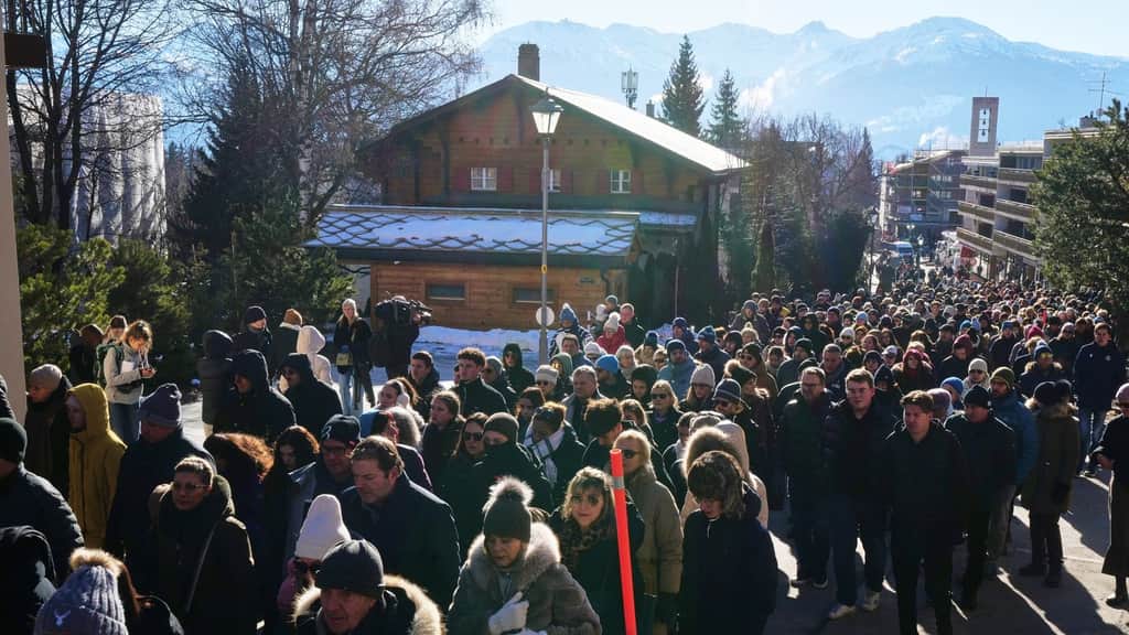 Hundreds march in silence as more Swiss bar fire victims identified