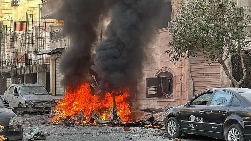 Syria urges civilians to leave Aleppo as clashes with Kurds continue